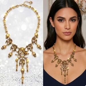 Gold plated pirate gun skull bones necklace